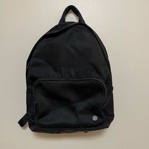 Lululemon black backpack for workout or commute. Great for work and workout gear